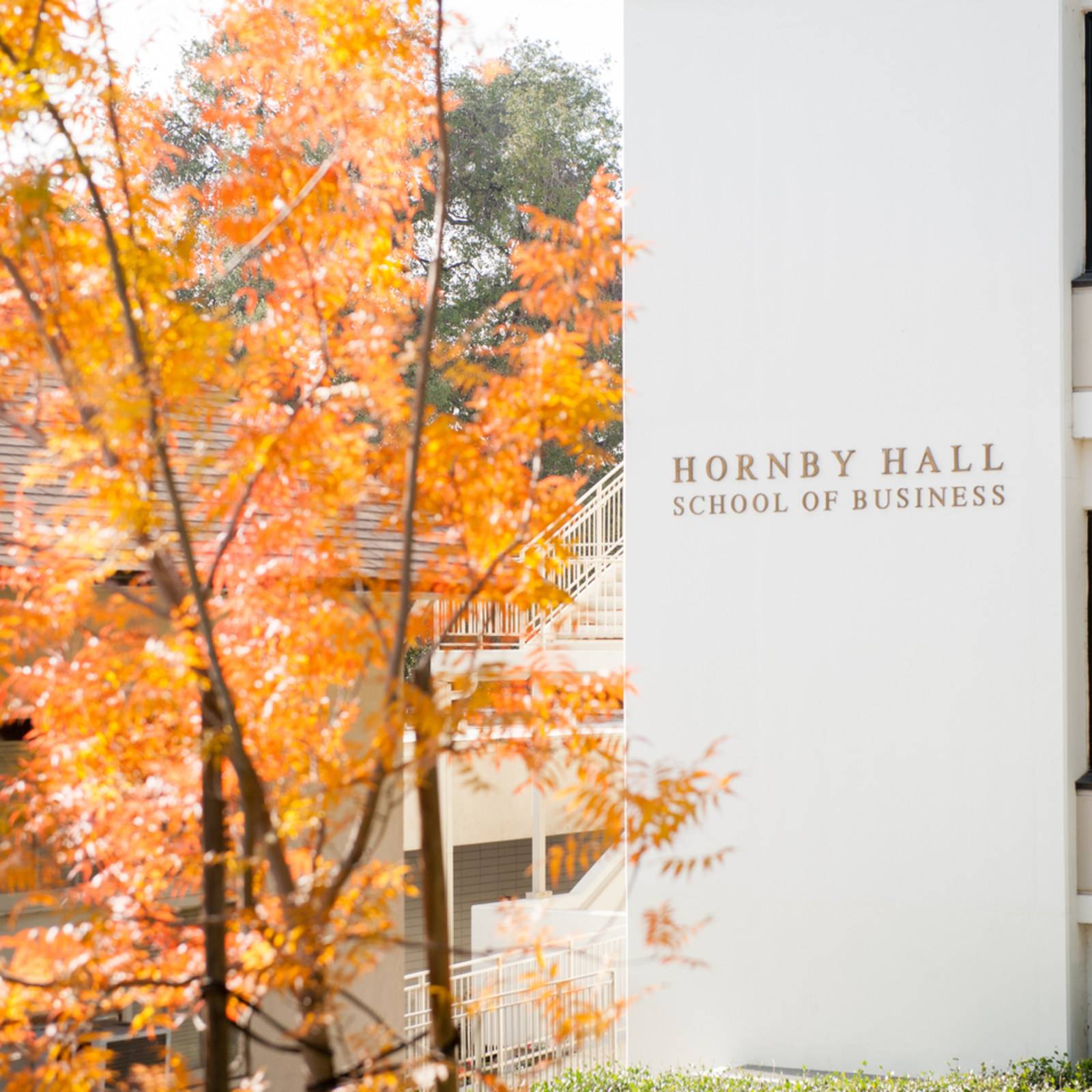 a white building with a sign on it