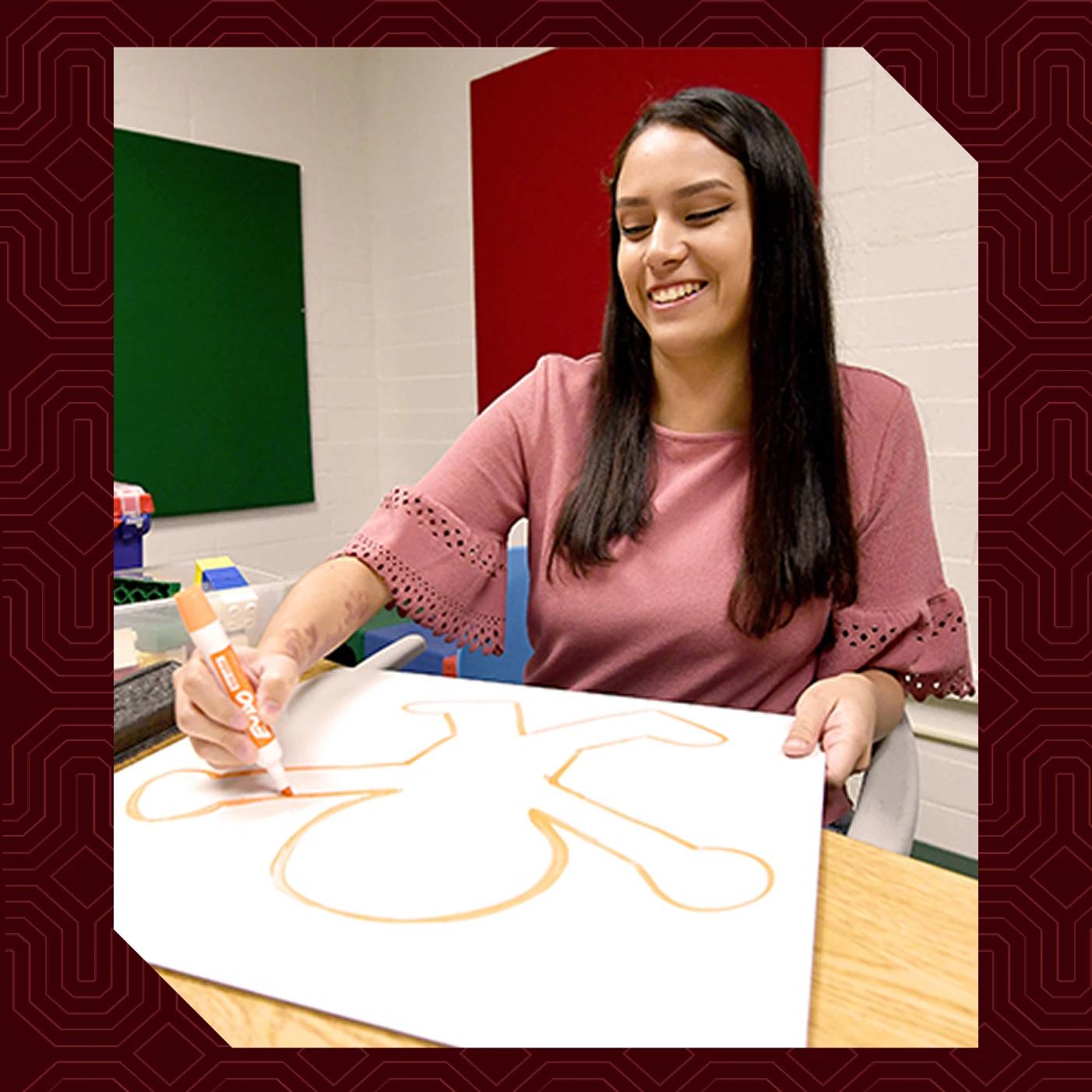 a woman drawing a person
