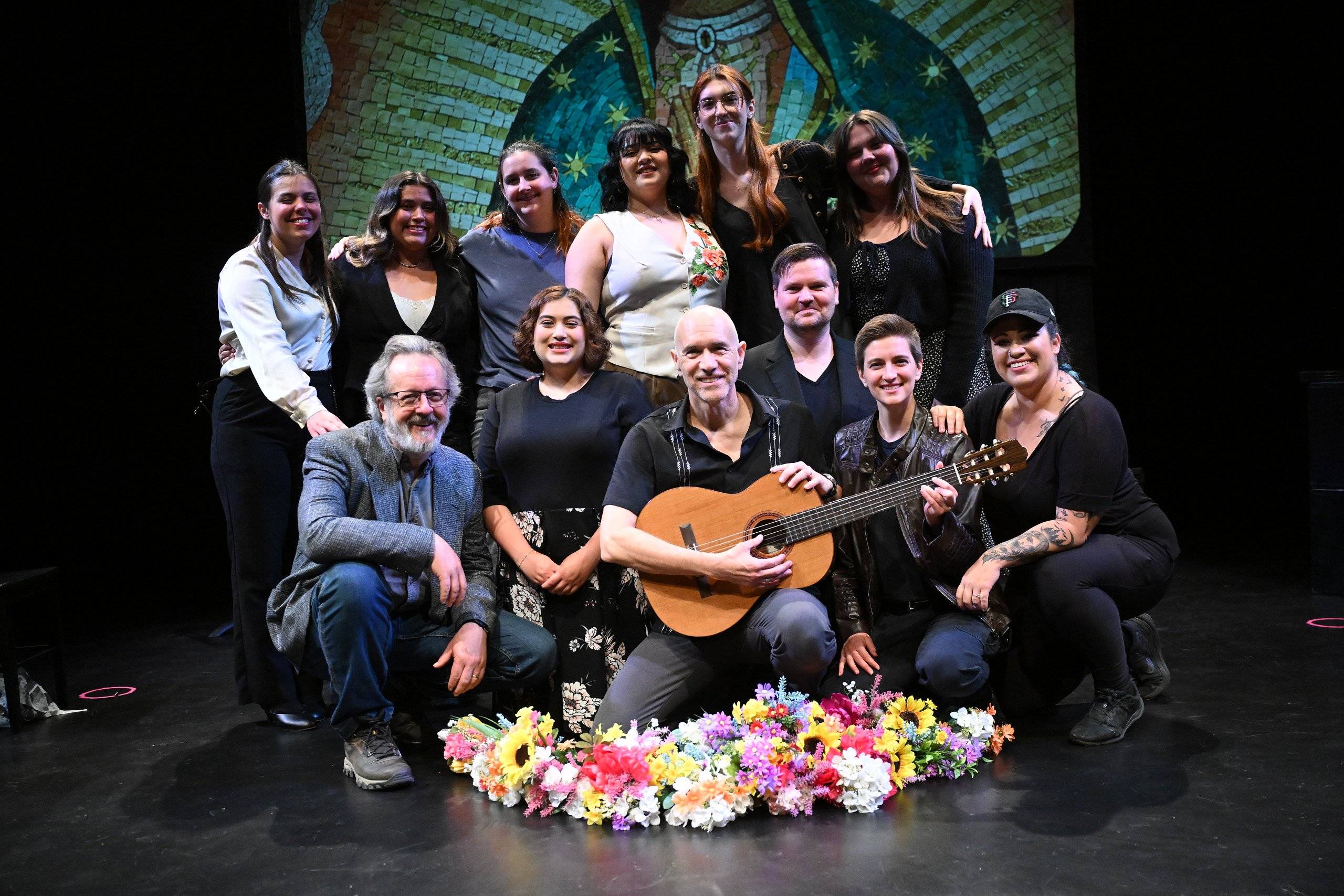 a group of people posing for a photo