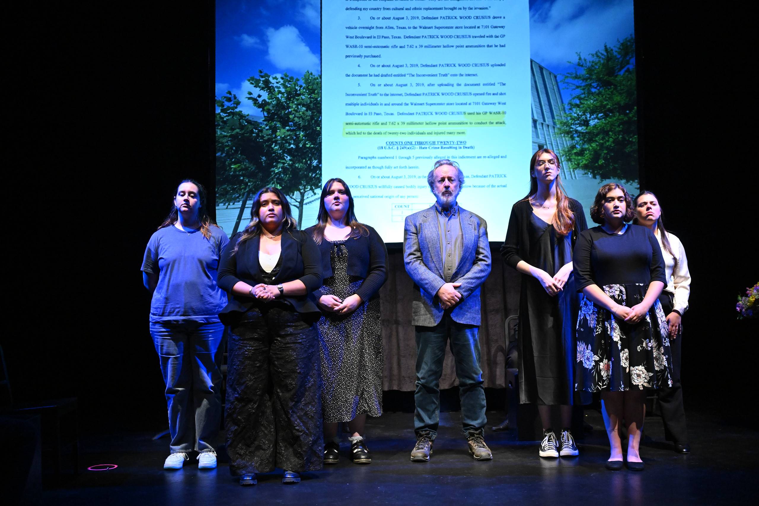 a group of people standing on a stage