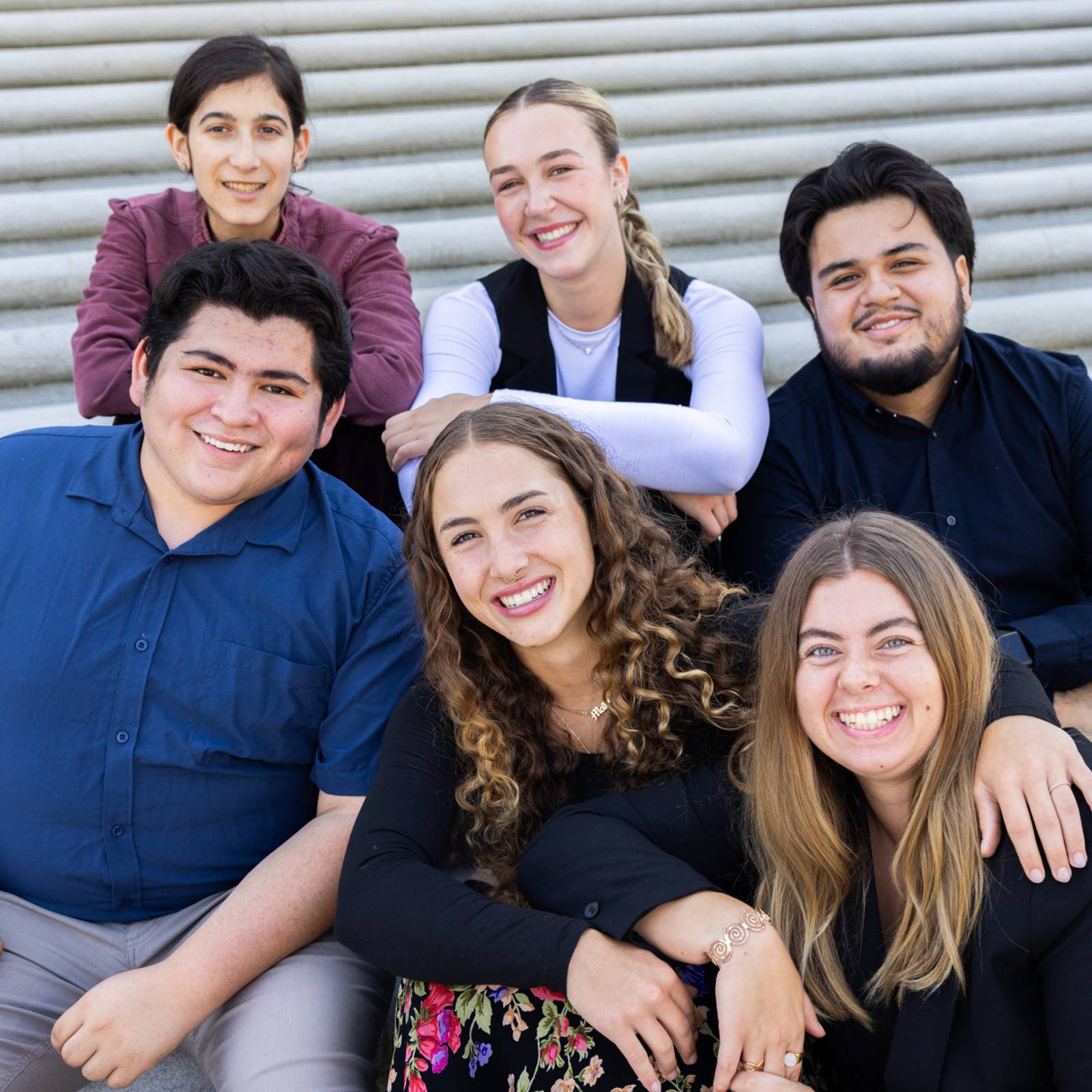 a group of people posing for a photo