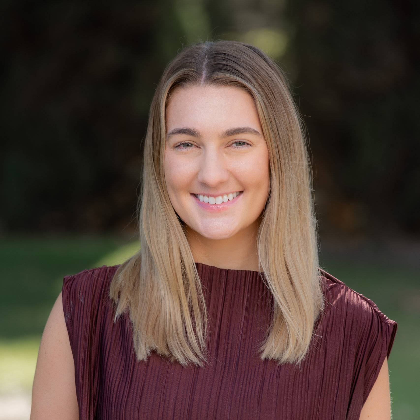 a woman smiling at camera