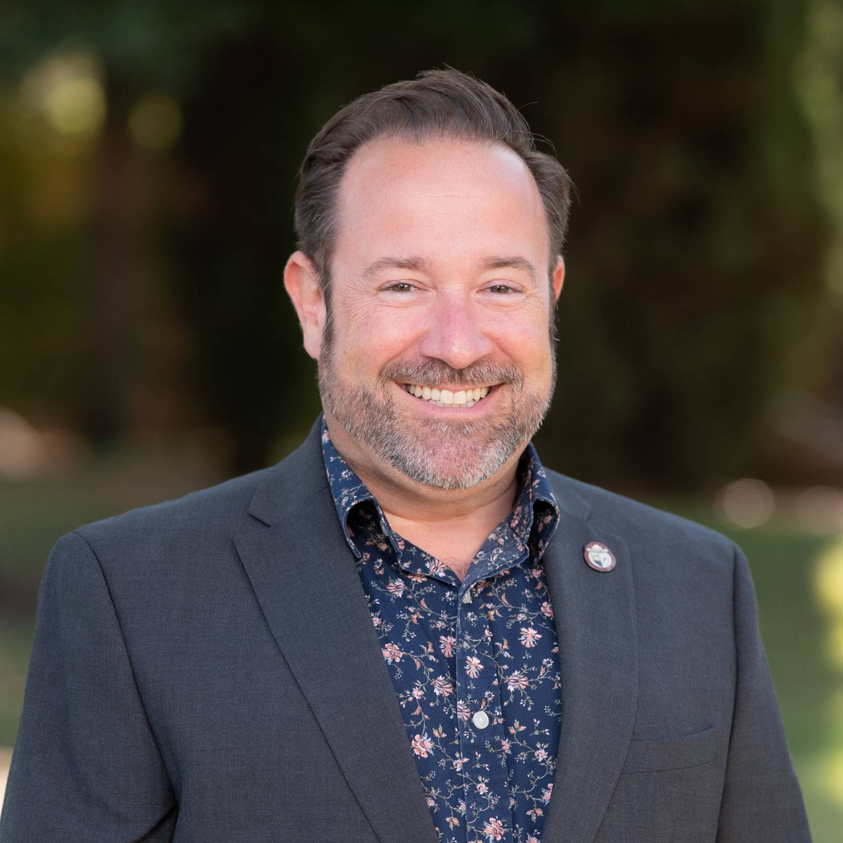 a man smiling for the camera