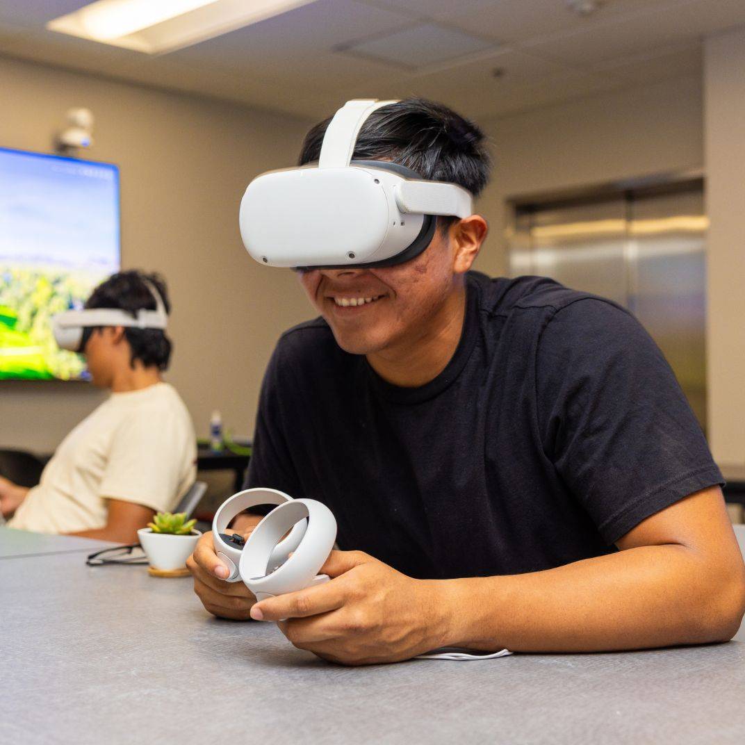 a man wearing virtual reality goggles