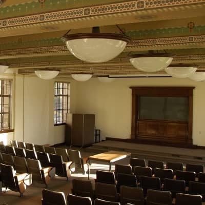 a room with chairs and a podium