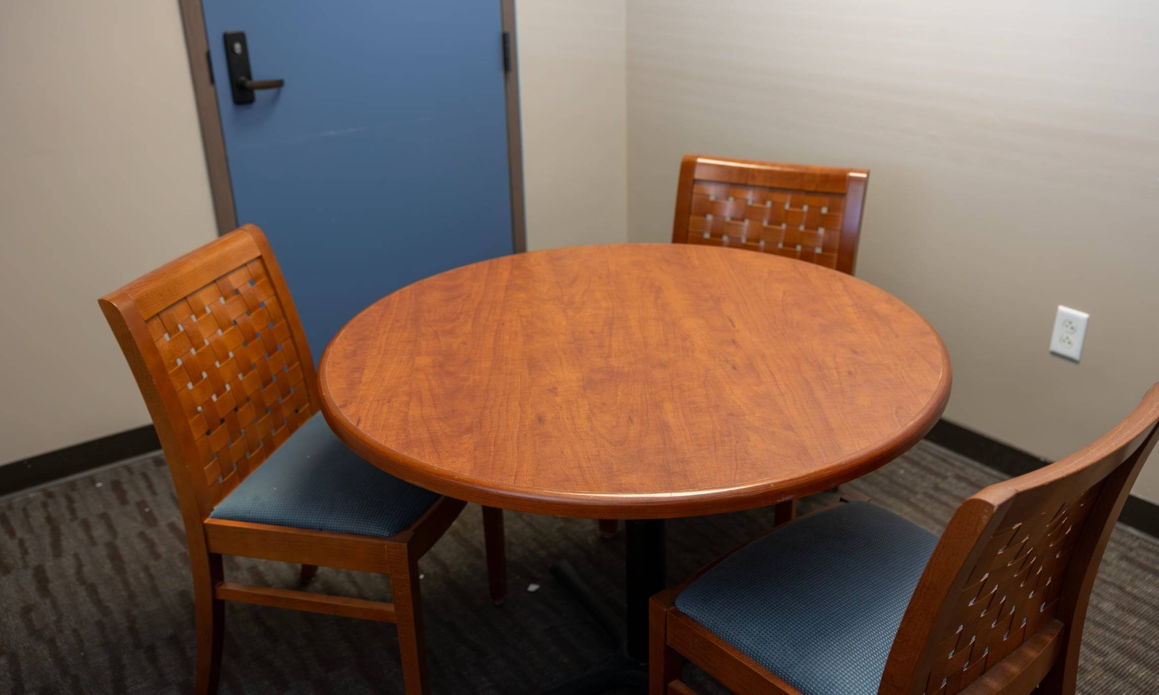 a table and chairs in a room