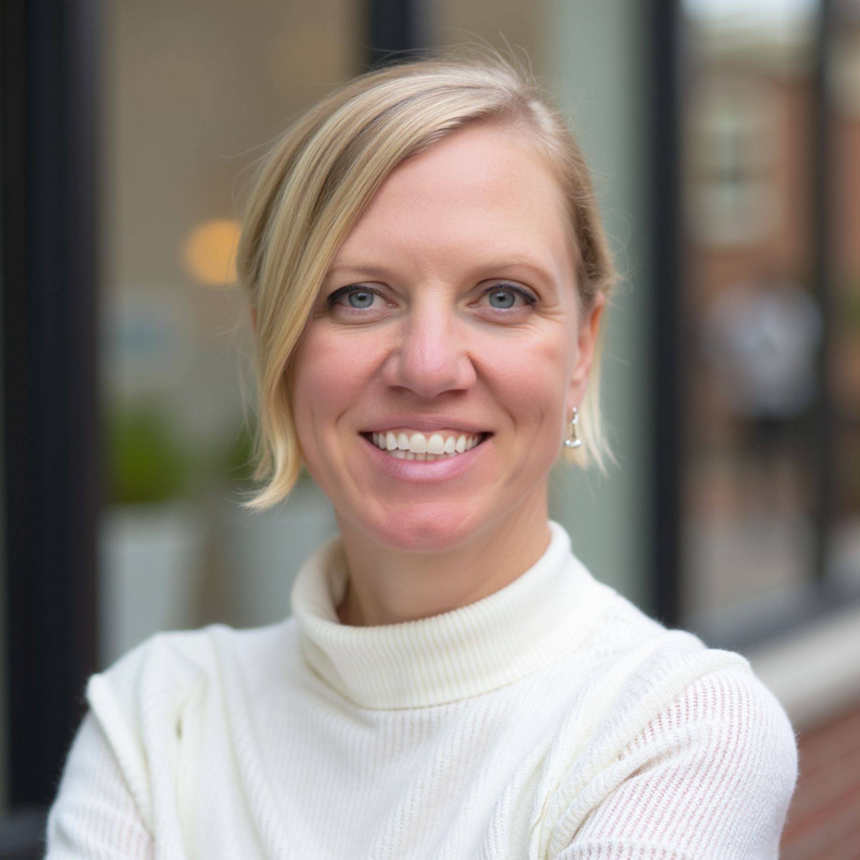 a woman smiling for a picture