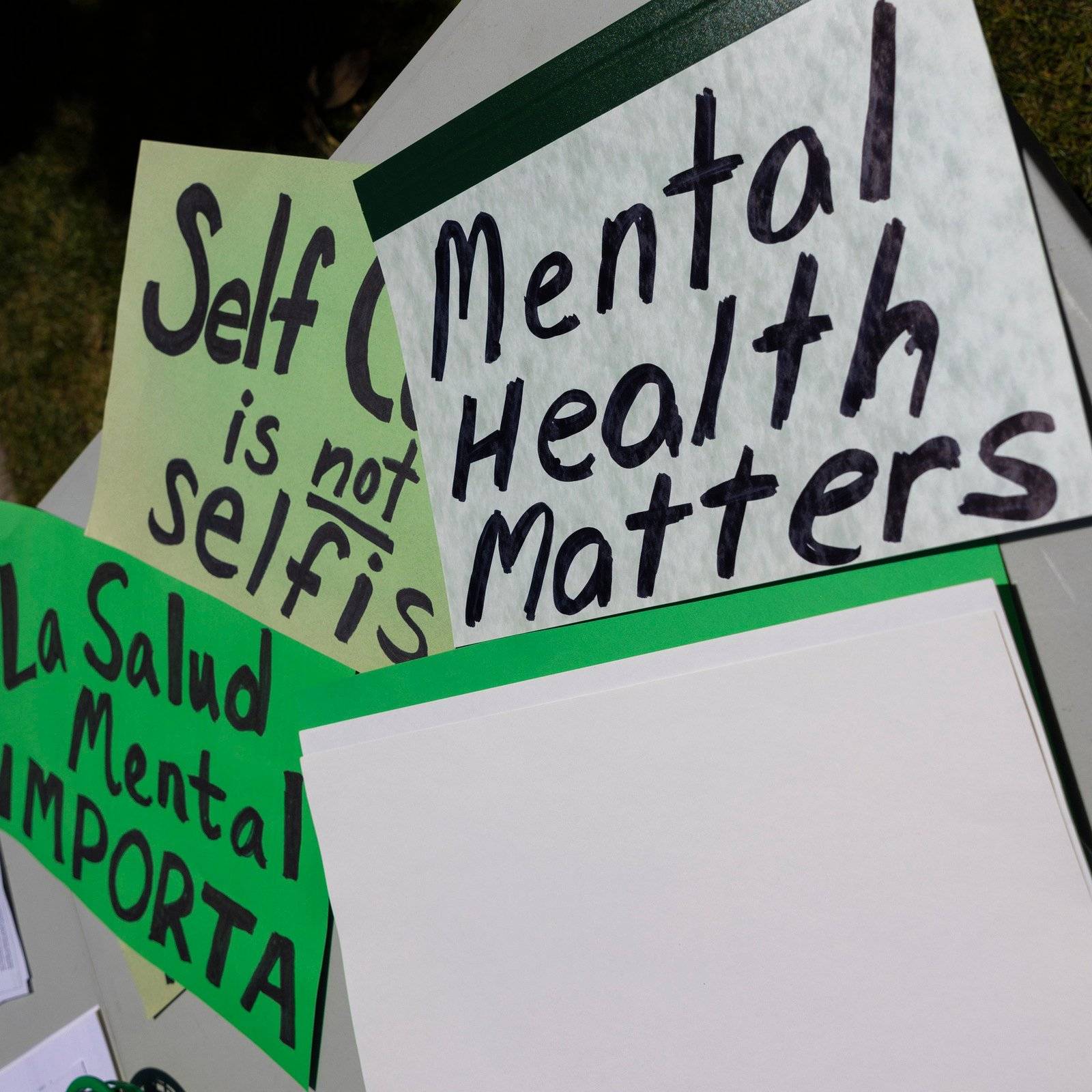 a group of signs on a white board
