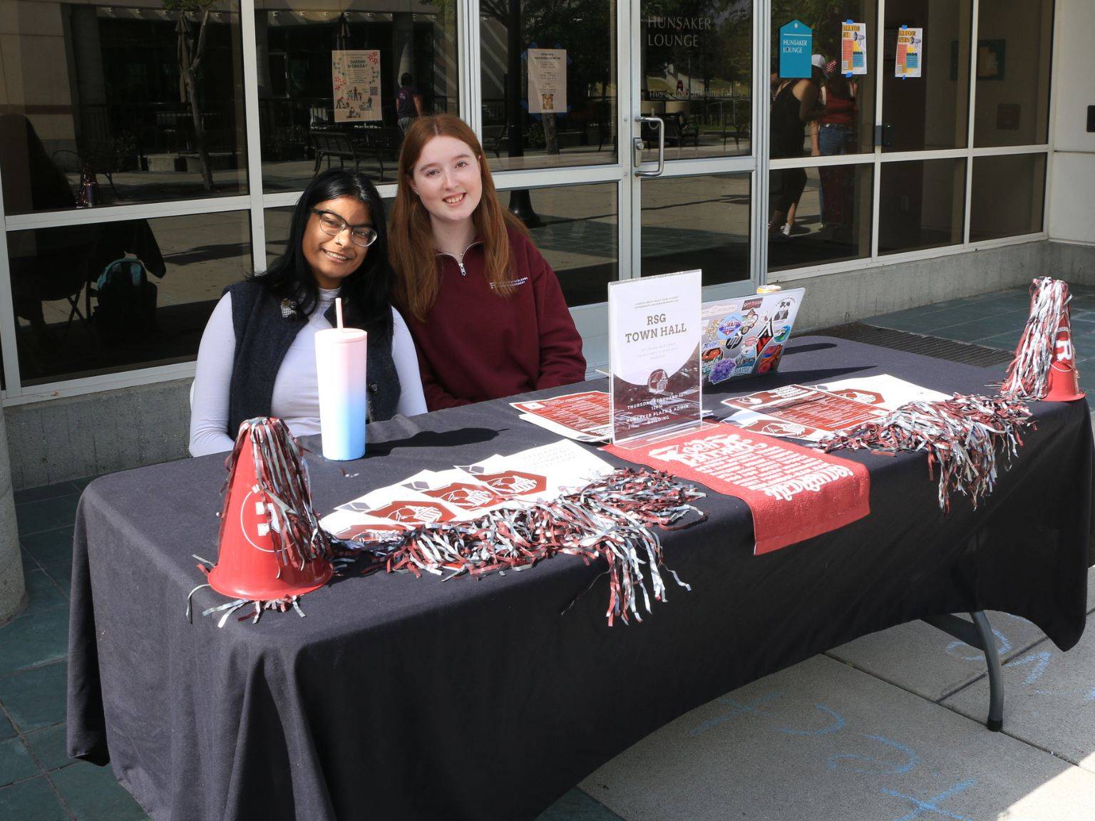 two women sitting at a table