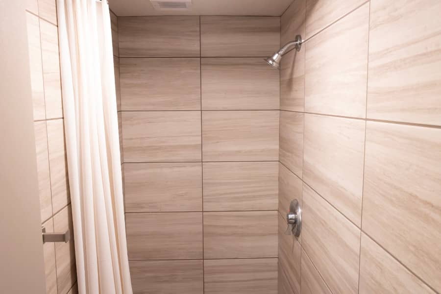a shower with a shower head