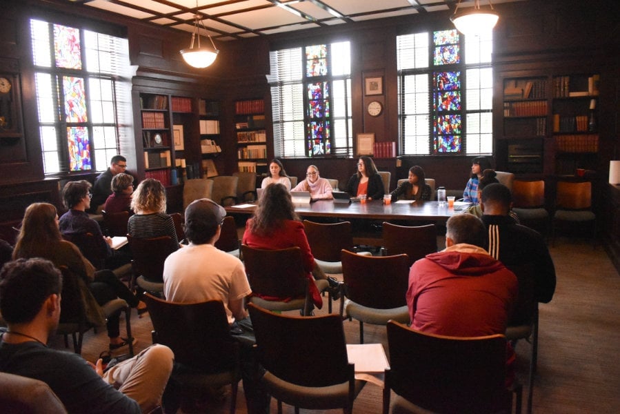 a group of people sitting in a room