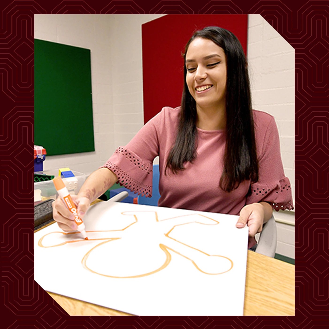 a woman drawing a person
