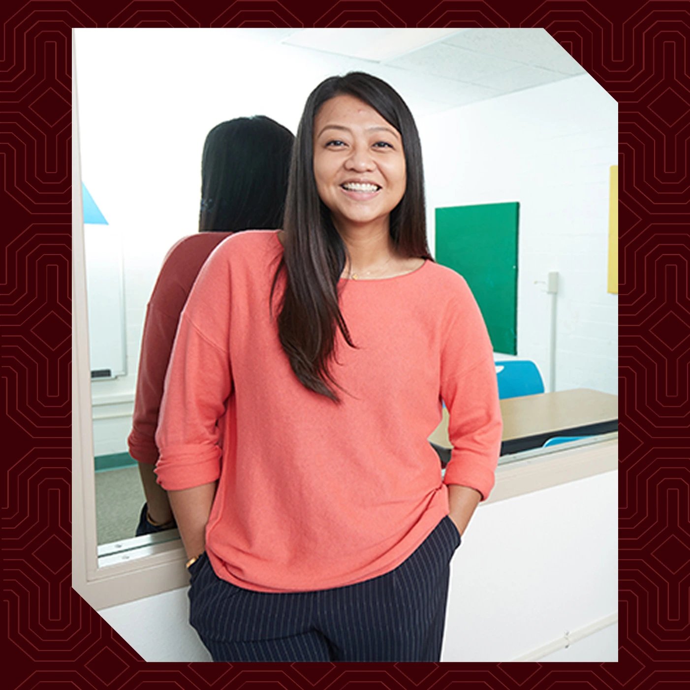 a woman smiling at the camera