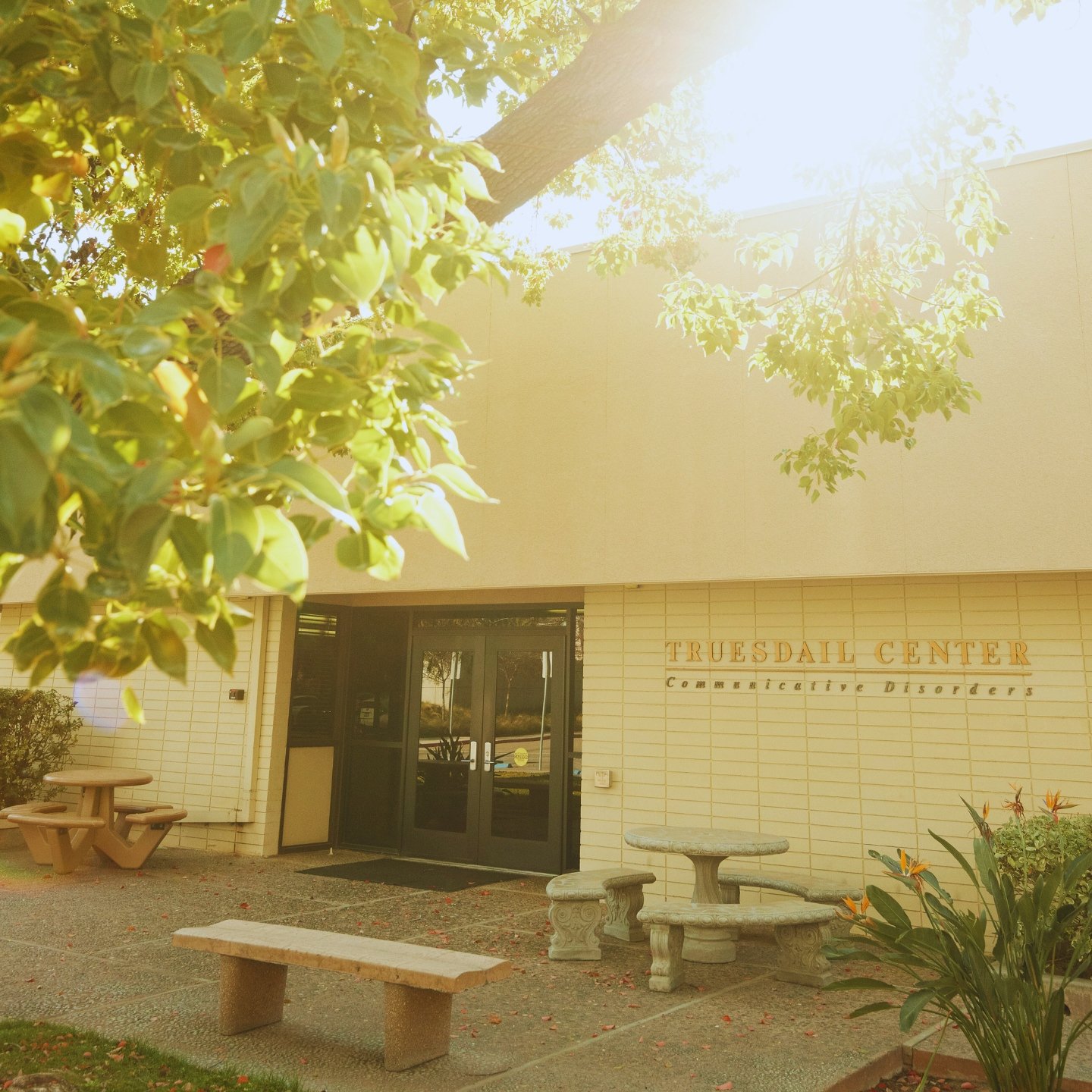 a building with benches and tables