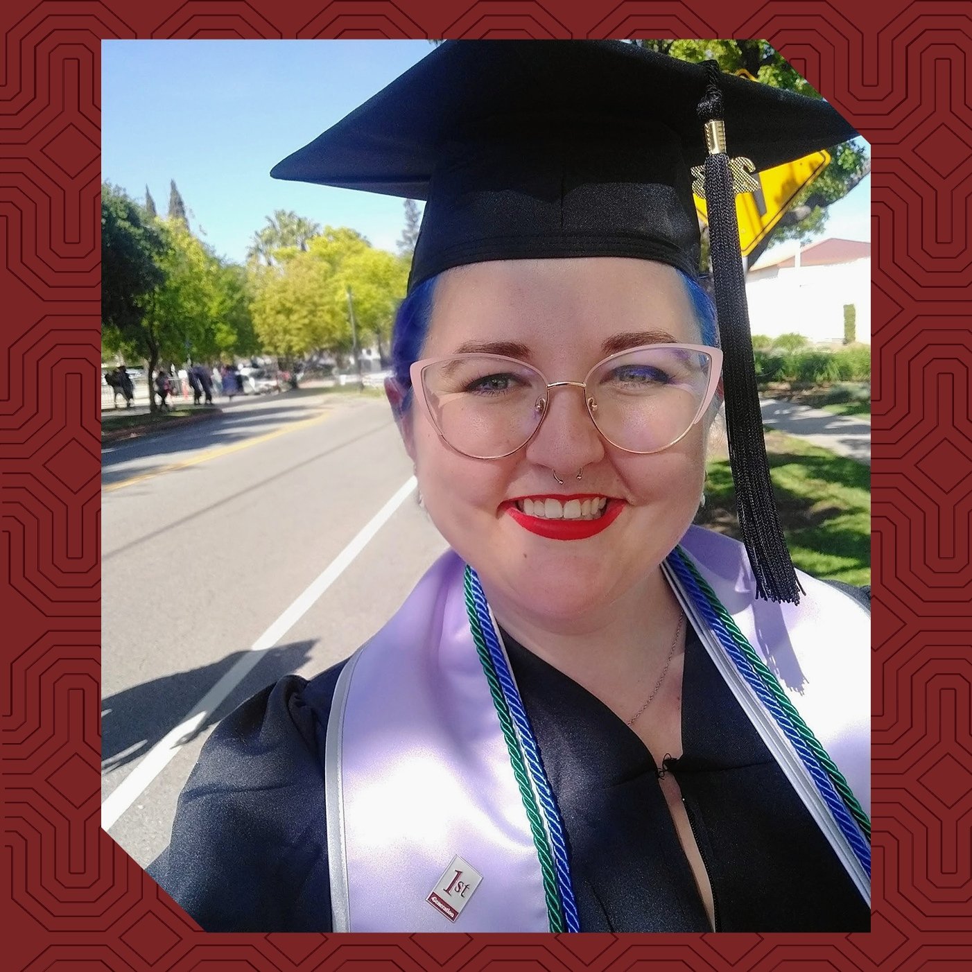 a woman wearing a graduation cap and gown