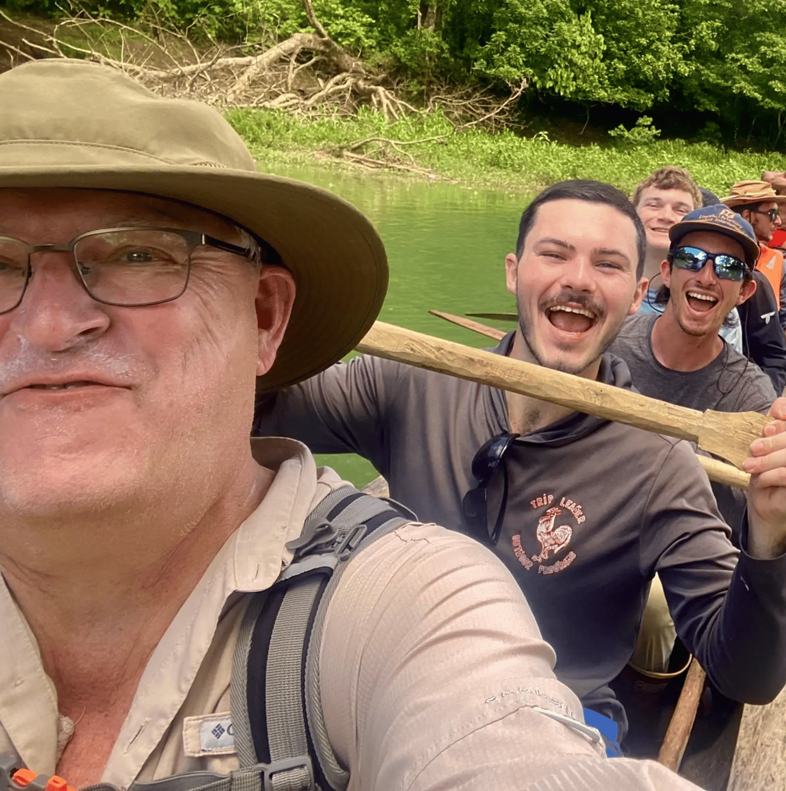 a group of people in a boat