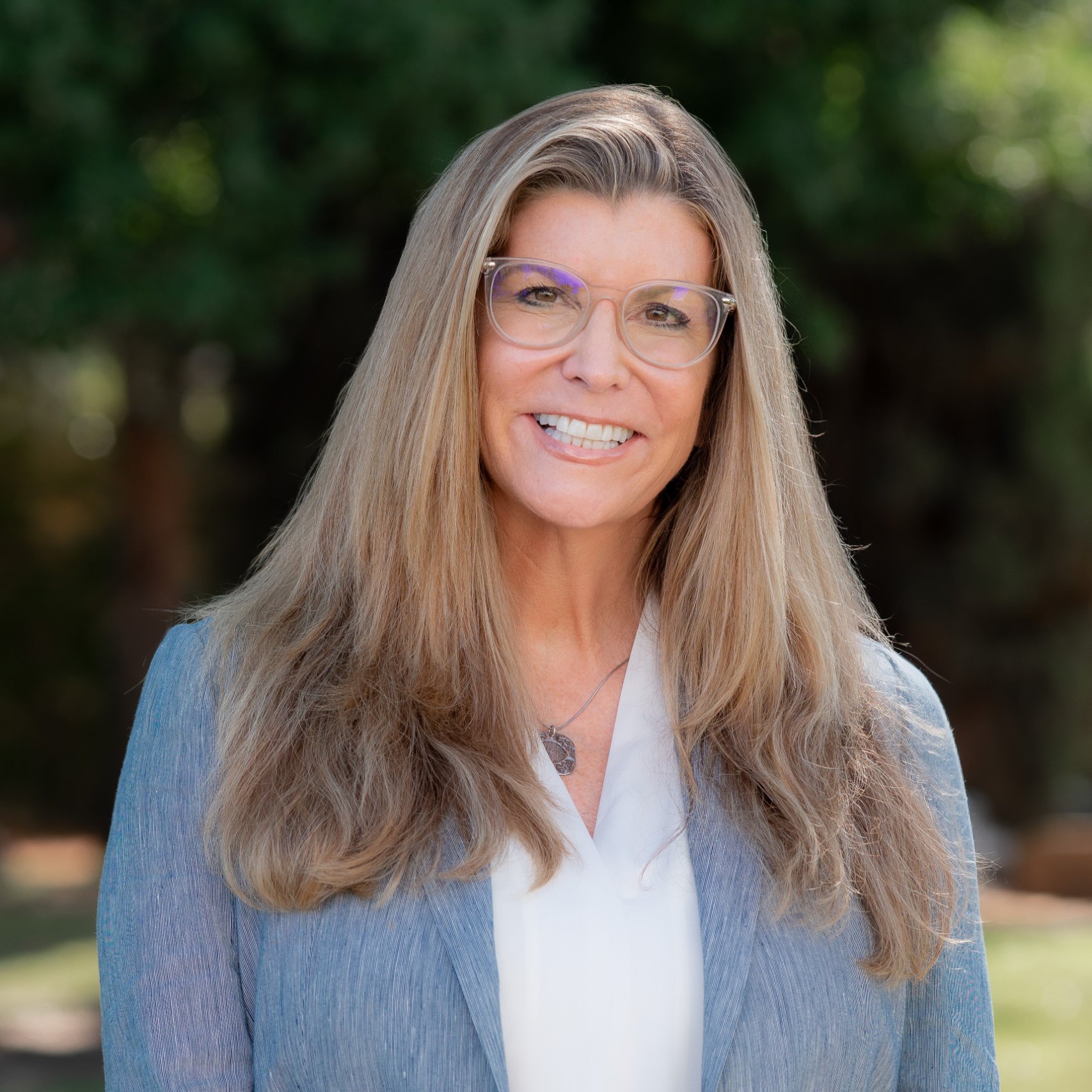 a woman smiling at camera