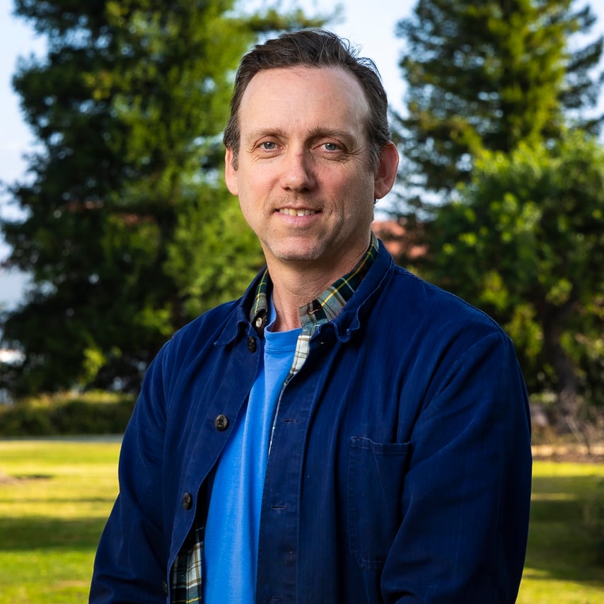 a man standing in a park