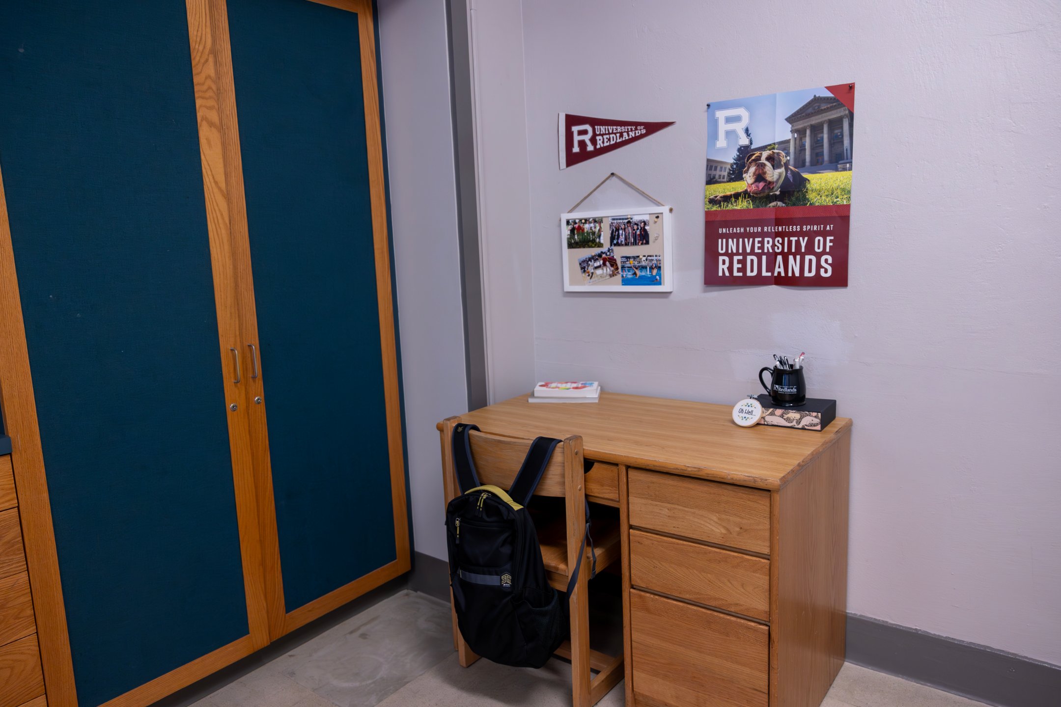 a desk with a backpack on it
