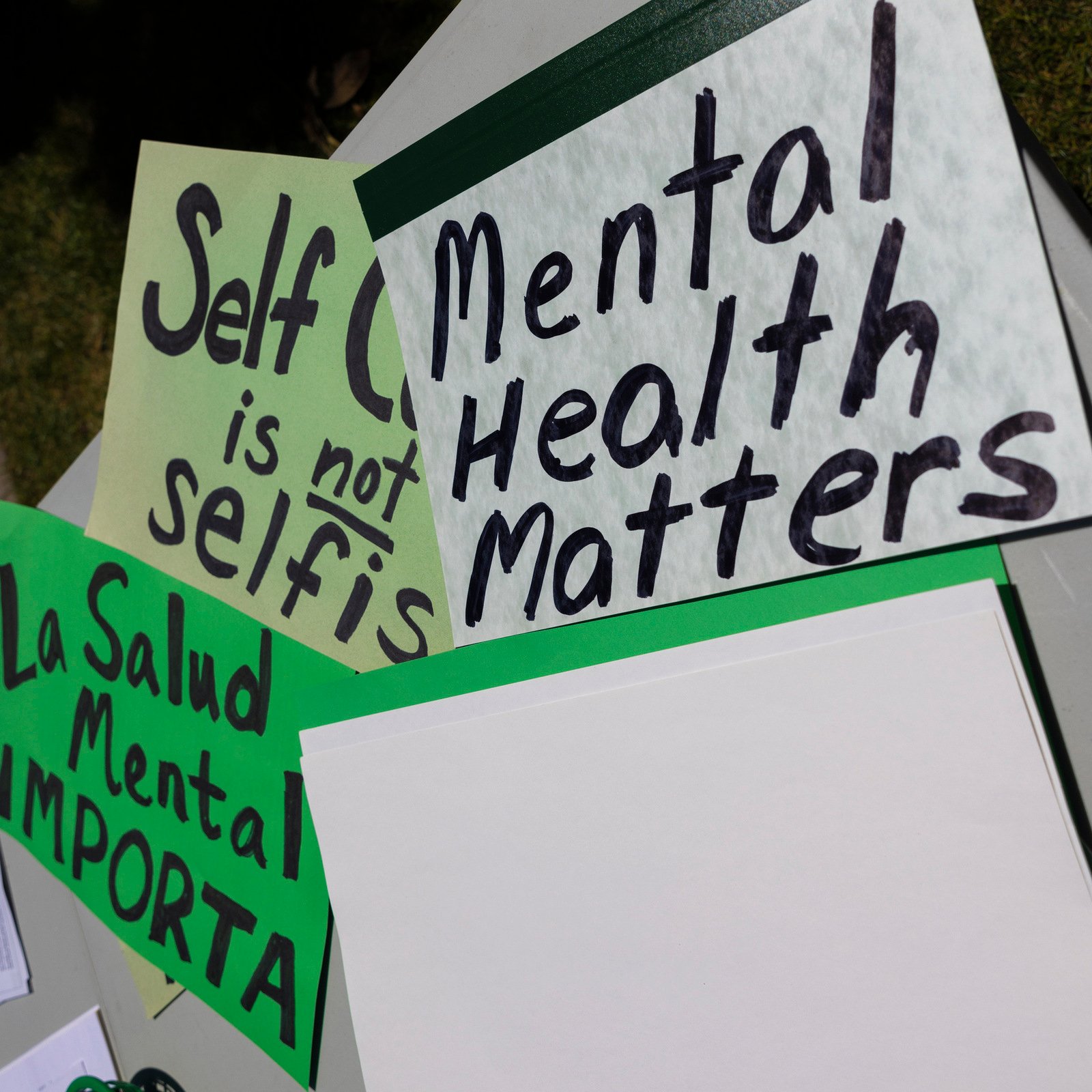 a group of signs on a white board