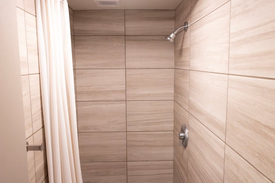 a shower with a shower head