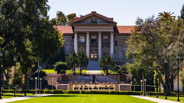 The Administration Building with Redlands hedge.
