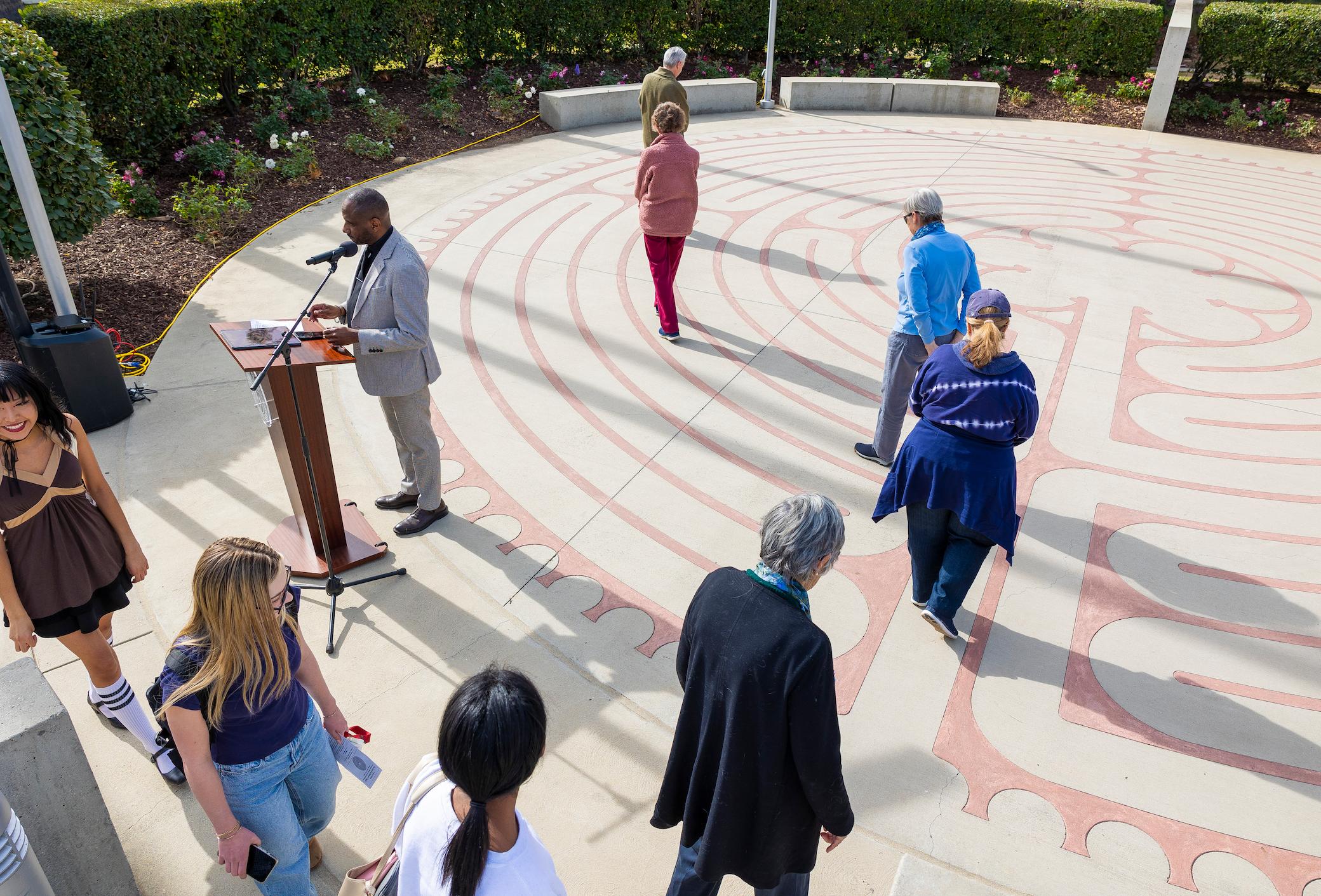 Event attendees walk the Labyrinth at Memorial Chapel as Rev. Dr. Darrell Wesley of Redlands First United Methodist Church delivers a reflection on the teachings of Rev. Dr. Martin Luther King Jr. 