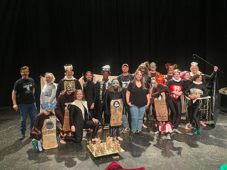 a group of people posing for a photo